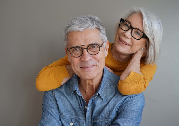 Portrait of relaxed senior couple wearing glasses