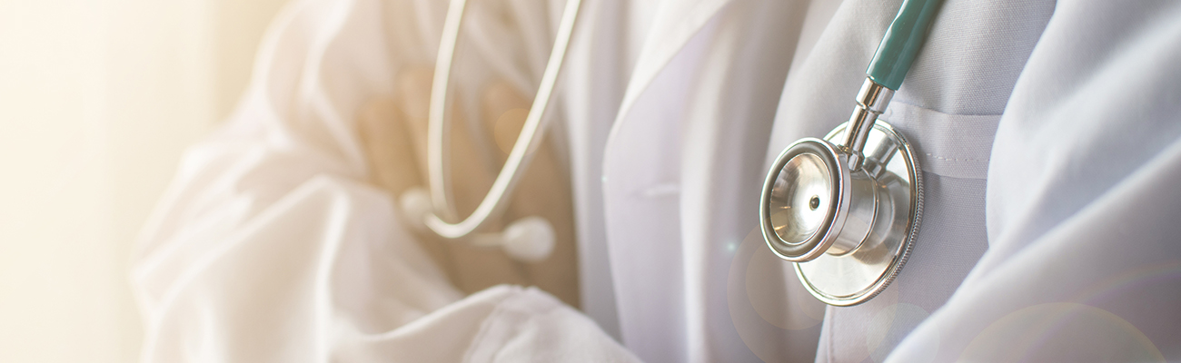 Close up photo of doctor robes and stethoscope
