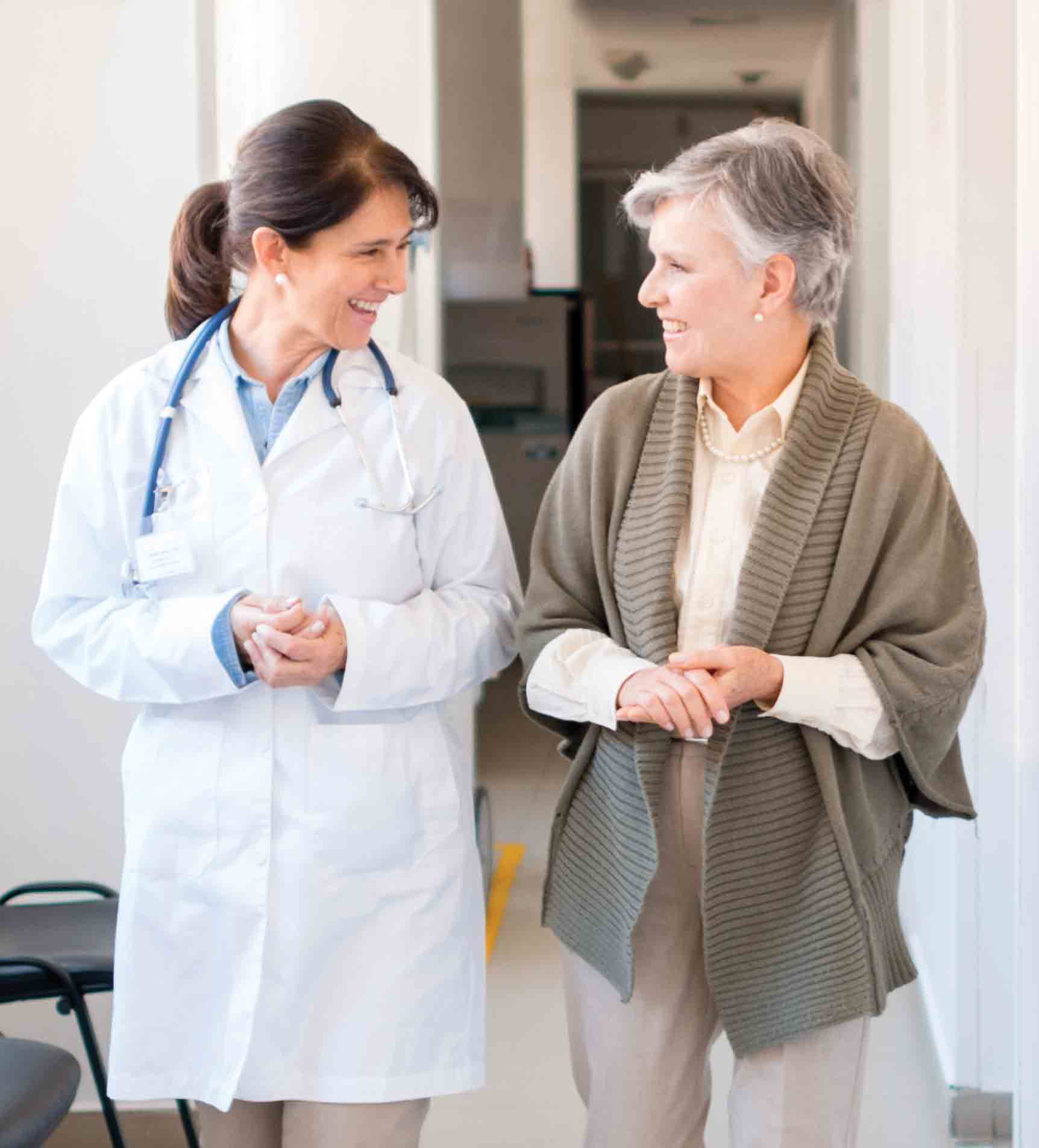 woman walking with doctor